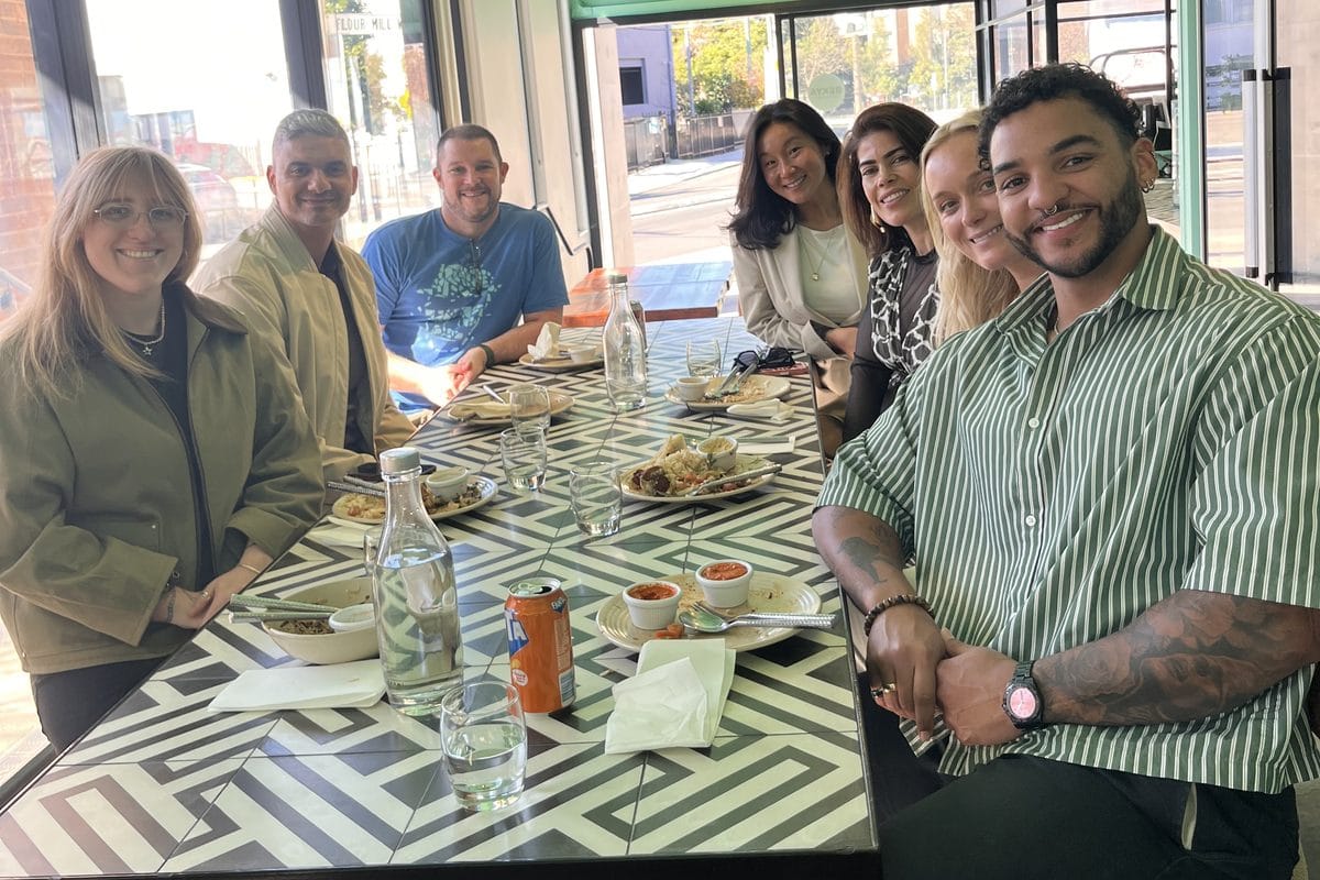 A group sharing lunch around a table